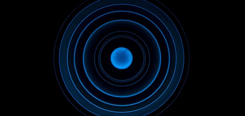 low angle view of spiral staircase against black background