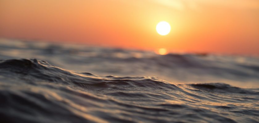 body of water during golden hour