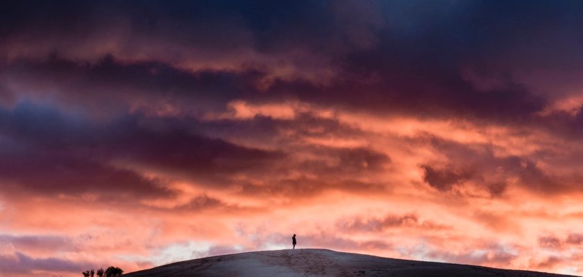 person on top of a hill