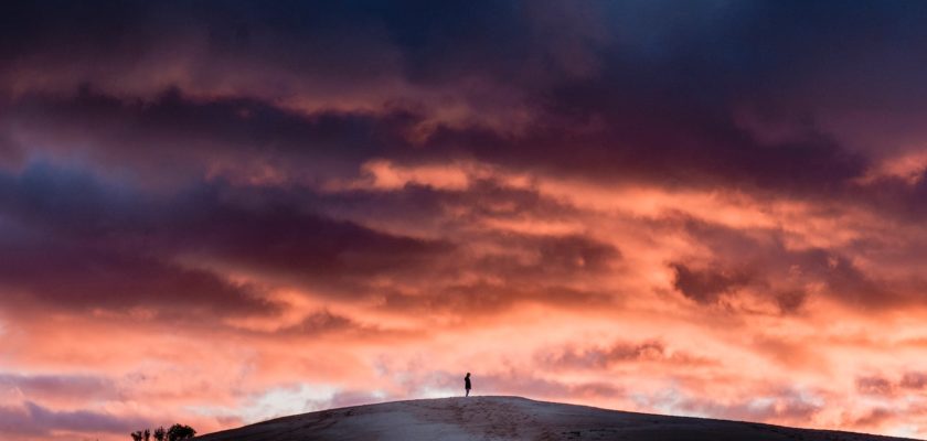 person on top of a hill