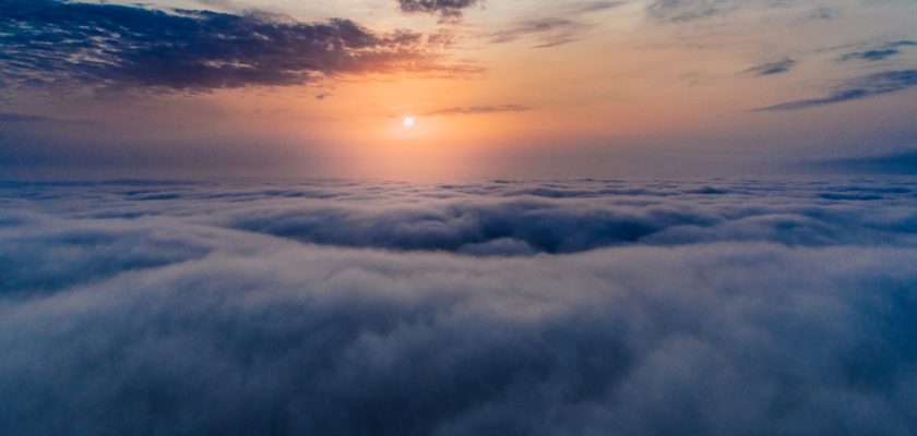 sea of clouds during sunset
