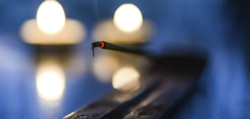 Incense in blurred background photo