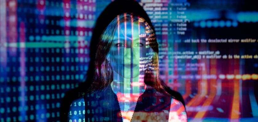 code projected over woman