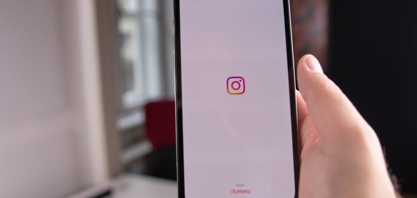 close up photo of a person holding cellphone